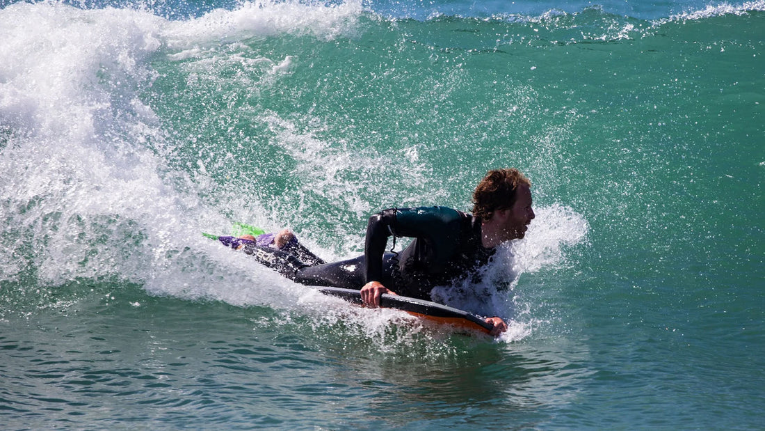 bodyboarder surfing a wave